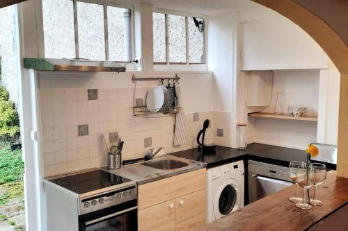 Dapur atau dapur kecil di Gite Pyrénées de charme jacuzzi 2/3 pers
