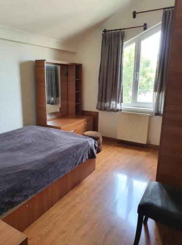 Postel nebo postele na pokoji v ubytování Tbilisi View House