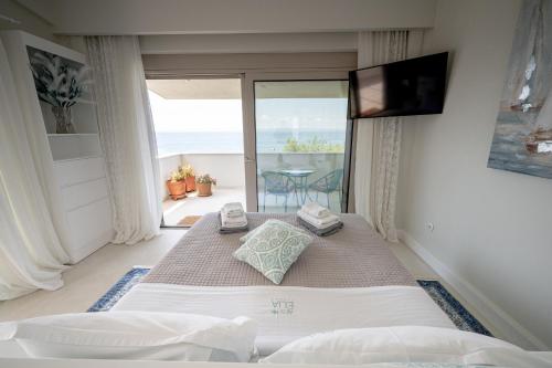 Postel nebo postele na pokoji v ubytování Akti Elia Villas Beachfront Chalkidiki