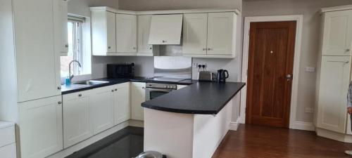 Kuchyň nebo kuchyňský kout v ubytování Carraroe Apartment 2
