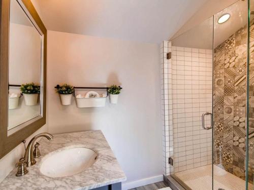 a bathroom with a sink and a shower at 3329 W 31st in Denver