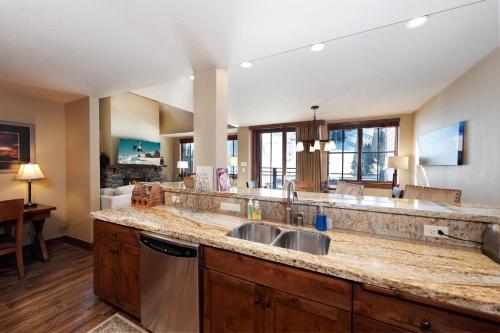 a kitchen with a sink and a counter top at Purgatory Lodge Unit 507 in Durango Mountain Resort