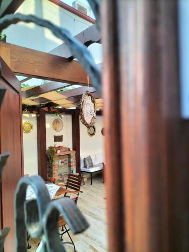 a view of a living room with a table and chairs at Hotel Mary's House in Selcuk