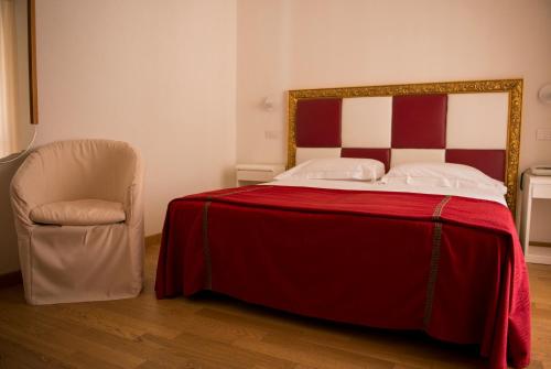 Cama o camas de una habitación en Grand Hotel Ambasciatori Wellness & Spa