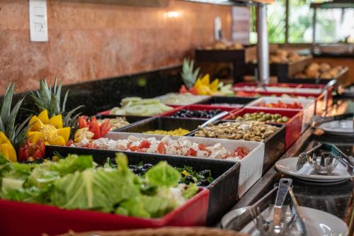 a buffet line with many different types of food at Hotel Dos Playas Faranda Cancún in Cancún