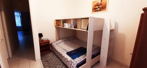 Ένα ή περισσότερα κρεβάτια σε δωμάτιο στο Cœur de Ville