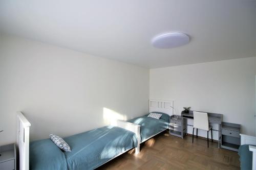 Postel nebo postele na pokoji v ubytování BAM apartments