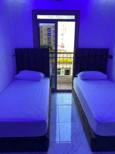 Säng eller sängar i ett rum på Hotel al andalus