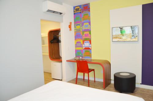 Ibis Styles Balneário Camboriú - 1 Quadra do Marにあるベッド