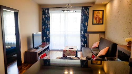 Fotografia z galérie ubytovania Apartament z balkonem Przy parku vo Varšave