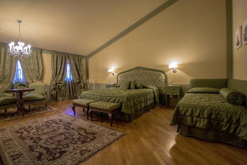 Tempat tidur dalam kamar di San Luca Palace