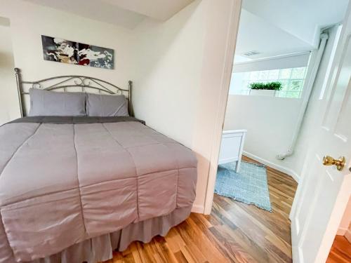 a bedroom with a bed and a window at Wrigley Garden Unit in Chicago
