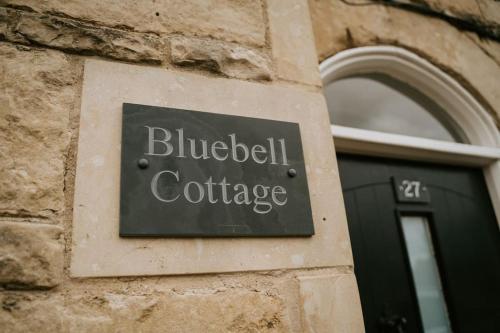 a sign on the side of a building at Bluebell cottage Branston Lincoln in Branston