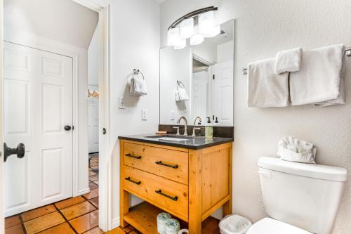 a bathroom with a sink and a toilet at Solano Vallejo 3288 in Moab