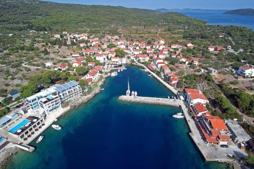 an aerial view of a harbor with boats in the water at Apartment Bozava 8100a in Božava