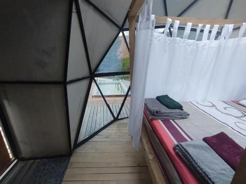 Postel nebo postele na pokoji v ubytování Glamping Paraiso