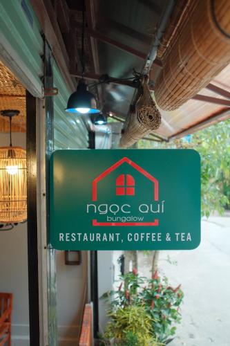 a sign for arestaurant restaurant coffee and tea at Ngoc Qui Bungalow in Phu Quoc