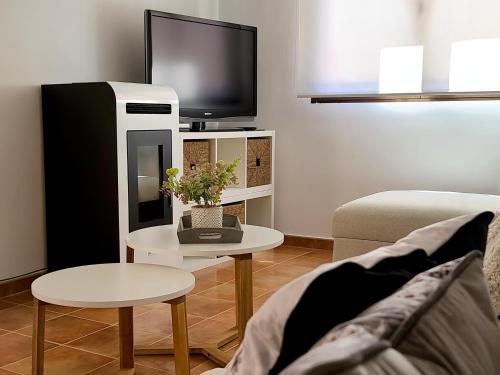 Televízia a/alebo spoločenská miestnosť v ubytovaní El Escondite de Gredos
