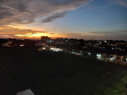 a view of a city at night with lights at Sunset View 969 PD Waterfront in Port Dickson