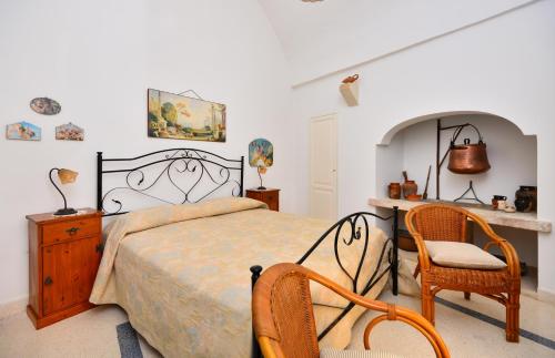 Una cama o camas en una habitación de Trappitu dei Settimi