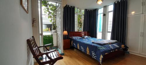 Giường trong phòng chung tại Green Homestay