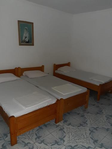 Ένα ή περισσότερα κρεβάτια σε δωμάτιο στο Vila Margaritar
