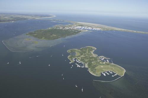 an island in the middle of the water at Zierikzee Appartement ZZ 41 at the Waterfront in Zierikzee