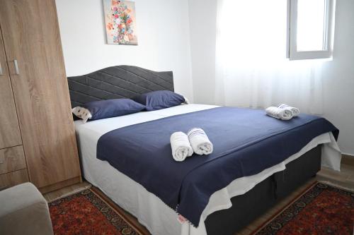 Đuričić Apartmaniにあるベッド