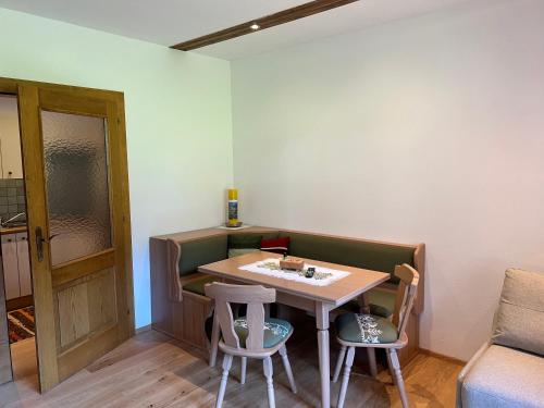 a small room with a table and two chairs at Unterwirt in Bad Kleinkirchheim