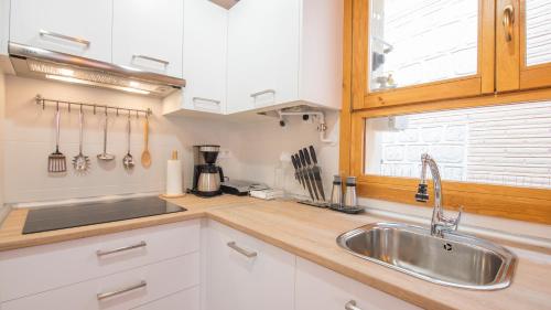 Kuchyň nebo kuchyňský kout v ubytování La Quinta Calle - Apartamentos Aloha Toledo
