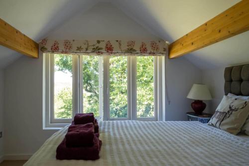 Ένα ή περισσότερα κρεβάτια σε δωμάτιο στο Valley View House