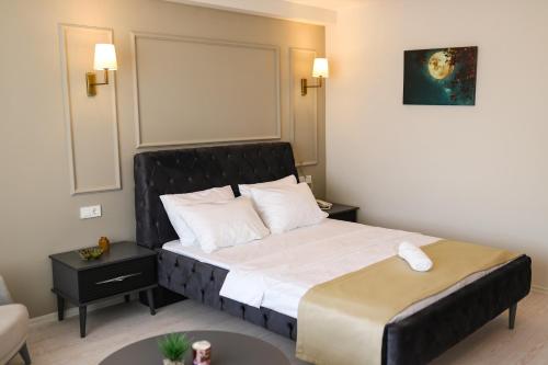 Un ou plusieurs lits dans un hébergement de l'établissement PETRA HOTEL TUZLA