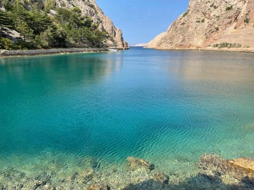 a view of a body of water in a canyon at Kuća za odmor “Dida” in Stinica