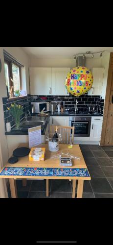 Dapur atau dapur kecil di Swansea Log Cabin