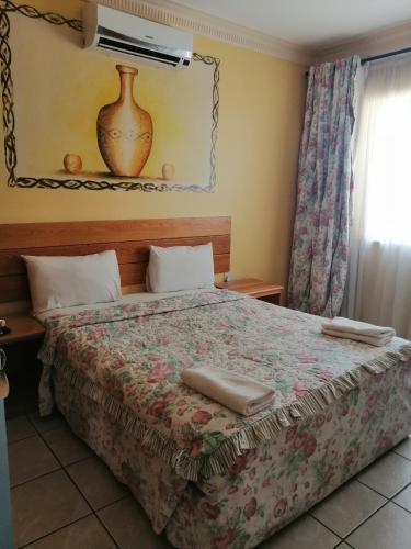 Postel nebo postele na pokoji v ubytování Mamli Guestlodge & Conferencing