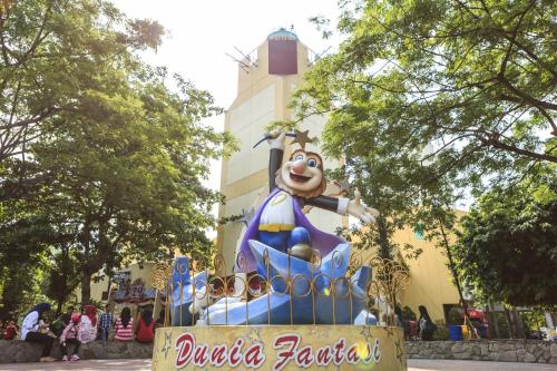 a disney parade float in front of disneyland at Holiday Inn Express Jakarta Pluit Citygate by IHG in Jakarta