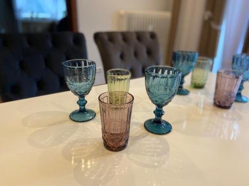 a group of glasses sitting on top of a table at Das Loreley Weinstuebchen in Sankt Goarshausen