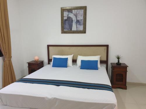 Postelja oz. postelje v sobi nastanitve Aqualine Residencies, Dehiwala