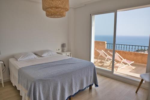 Posteľ alebo postele v izbe v ubytovaní Maison à Mascarat Hills avec vue sur la baie d'Altea
