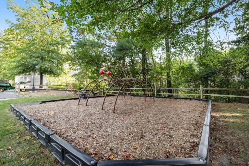 a playground in a park with apples on it at Sea Colony - 1804 Doubles in Bethany Beach