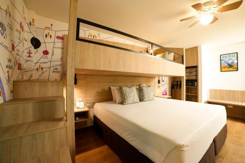 a bedroom with a bed and a bunk bed at Centro by Casa Andina in Lima