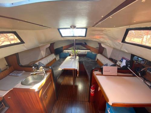 a view of the inside of a boat with a sink at Mettre les voiles à Deauville in Deauville