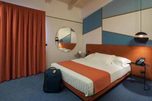 Postel nebo postele na pokoji v ubytování Best Western Plus Dimora del Monaco