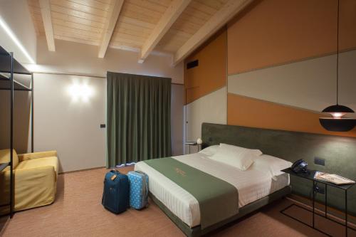 Postel nebo postele na pokoji v ubytování Best Western Plus Dimora del Monaco