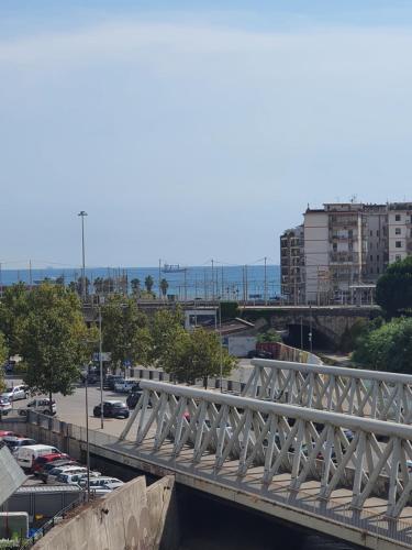 a bridge over a city with a parking lot at B&B Salerno Urban Suite 57 in Salerno