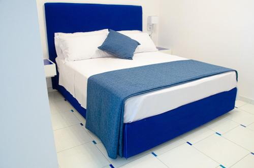 Cama ou camas em um quarto em Oltremare 13 - Appartamento Scala di Ravello