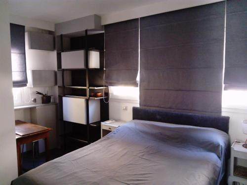 Posteľ alebo postele v izbe v ubytovaní Bel appartement 3 chambres vue port de Golf Juan