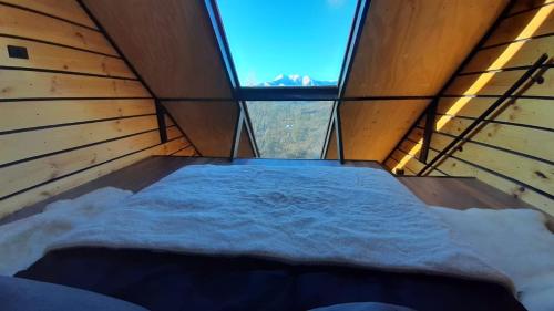 Ein Bett oder Betten in einem Zimmer der Unterkunft El Contemplatorio