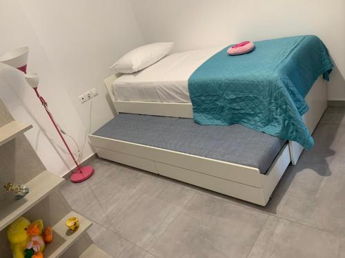 Posteľ alebo postele v izbe v ubytovaní Paradise House