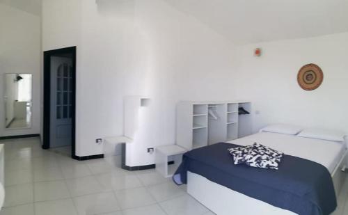 Postel nebo postele na pokoji v ubytování Sulcis Camere
